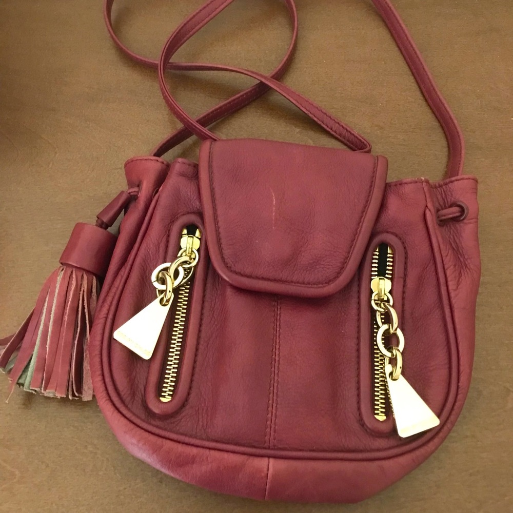 EUC See By Chloe Maroon/Merlot Tassel Crossbody Bag with Triangular Zipper Pulls
